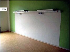 ACROLEN wall protection (acryl vinyl) behind the patient bed 