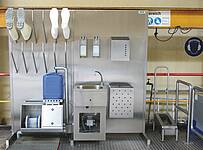 Hygiene wall with boot dryer and sole cleaning machine 
