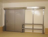 Impact protection rail for protection the sliding door