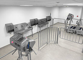 Personal hygiene station planned in separated room for the entrance into the production area and return way to the social area rooms (view: entrance side). 