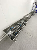 Disinfection trough for stainless steel pipes