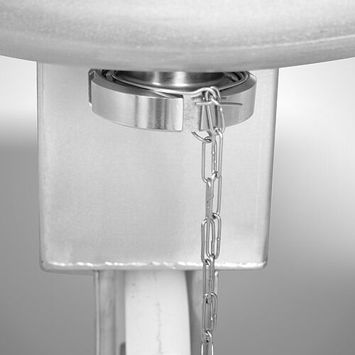 Detail: Front spout at the bottom with screw cap