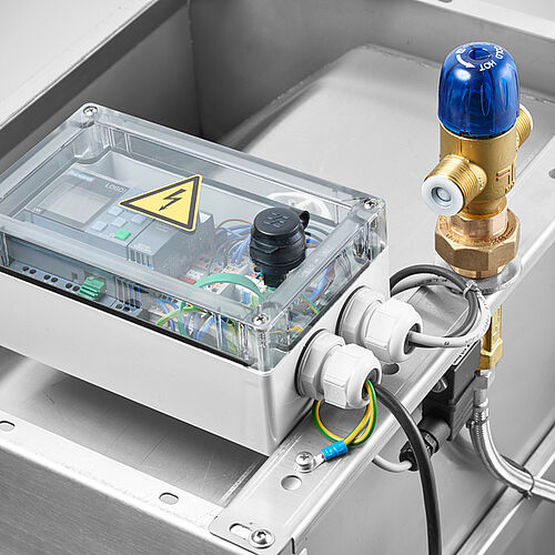 Hand wash basin with anti-legionella bacteria flushing, Detail: SIEMENS Logo Control