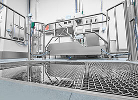 Materialschleuse mit Durchfahr-Desinfektionsbecken innerhalb einer Personal-Hygieneschleuse 
