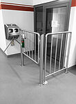 Hand disinfection device with turnstile type Desi-Control Ecoline with escape route railing gate (ID 21-62175)